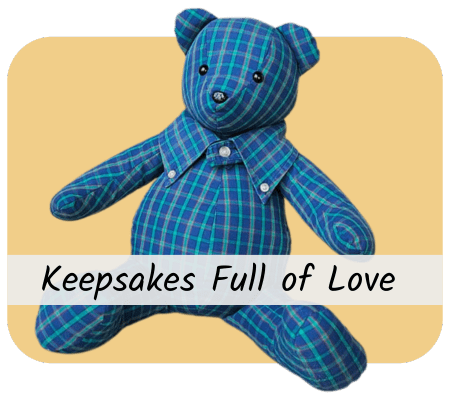 Button reading 'Keepsakes Full of Love' featuring a handmade teddy bear.